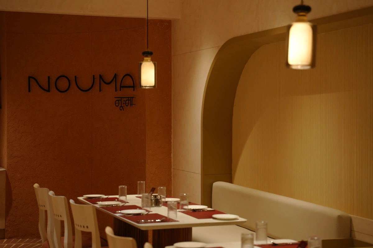 NOUMA dining hall with pendant lanterns